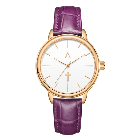 Wristwatch with purple strap and gold case on white background